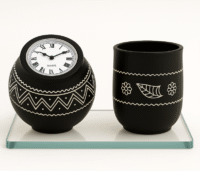 Black pottery clock and pen holder